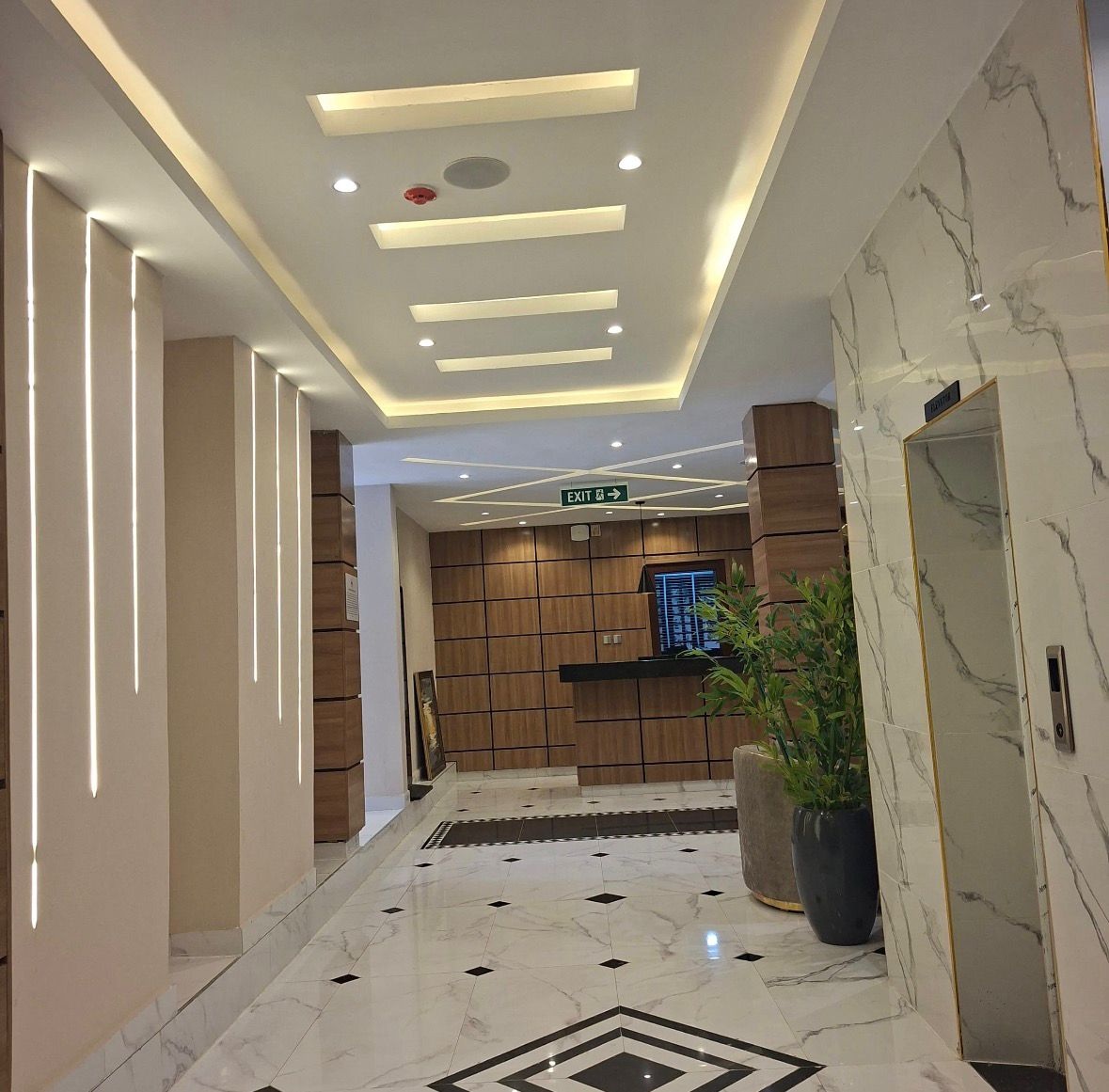Bon Hotel Kabuwol Ibadan marble lobby corridor