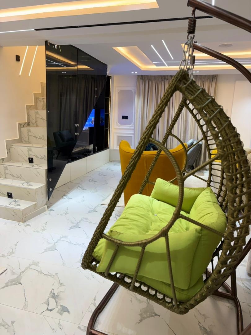 Project LS marble staircase with hanging swing chair