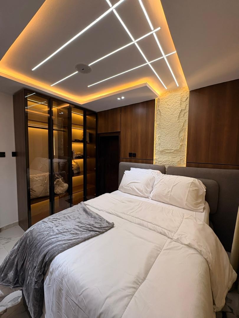 Project LS bedroom with warm wood panelling